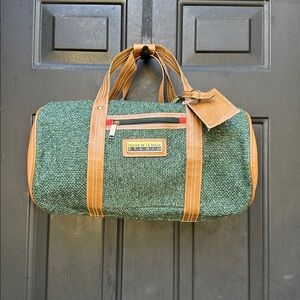 Oscar de La Renta Studio small duffel green tweed with tan straps & luggage tag